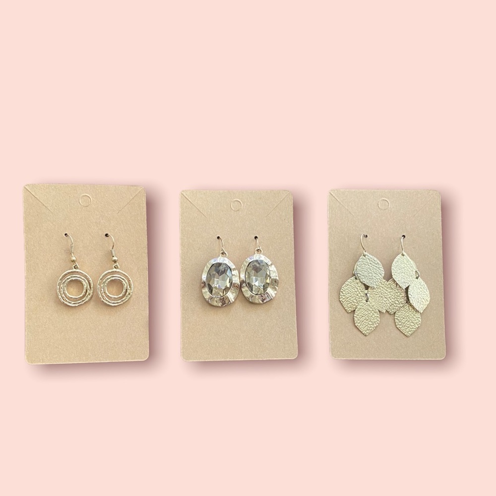 Three pairs gold tone dangle earrings